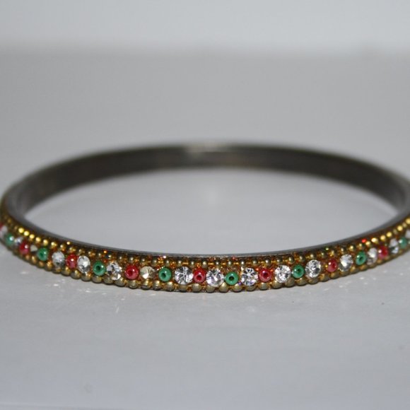 Vintage Jewelry - Vintage gold bangle with red green and white